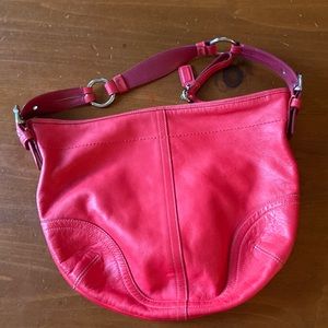 Red leather Coach handbag